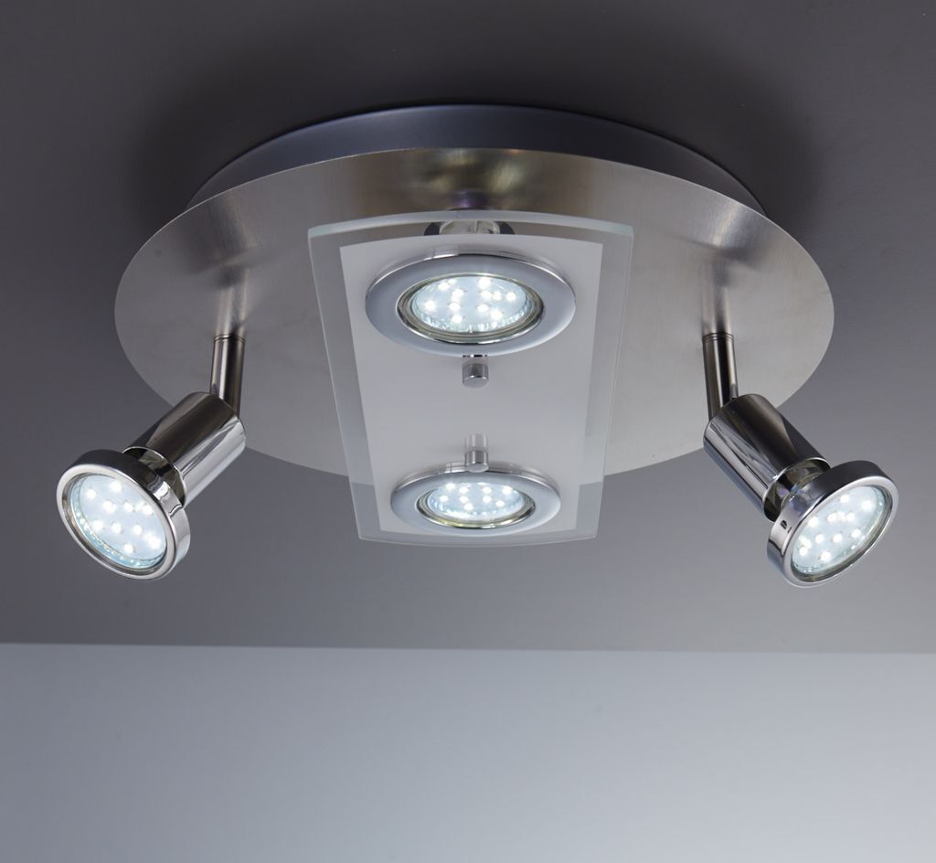 A ceiling light fixture with multiple LED spotlights.