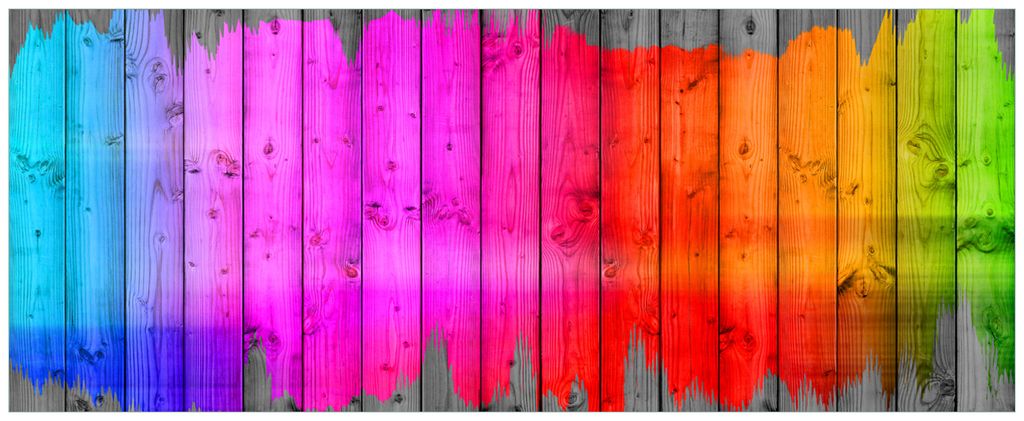 Wallario Premium Glasbild, freischwebende Optik, kräftige Farben, Größe 125 x 50 cm Motiv Holzpaneel - Bemaltes buntes Holz