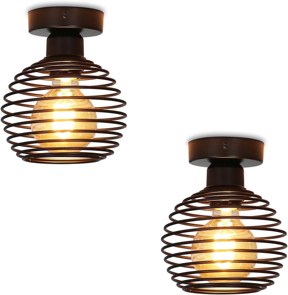 Two identical black ceiling lights with a retro design, each featuring a spiral metal cage and a visible Edison-style bulb.
