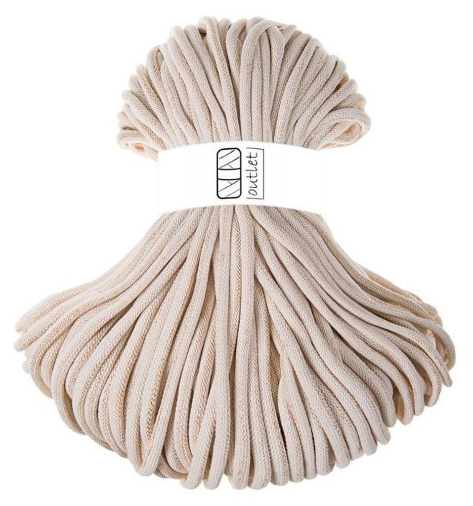 A bundle of beige cord is shown against a white background.