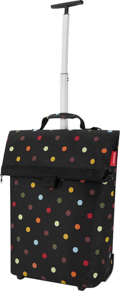 A polka dot shopping trolley with a retractable handle.