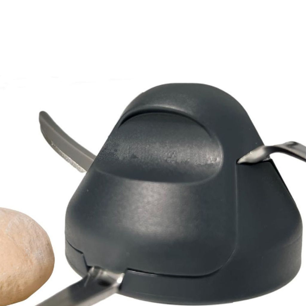 A close-up of a food processor attachment with blades.