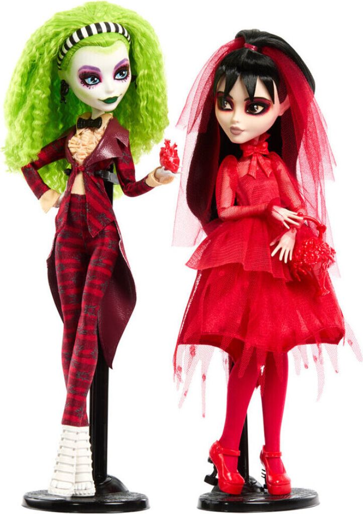 Two Monster High dolls, one with green hair and a red pinstripe suit, the other with black hair and a red dress, are displayed on stands against a white background.