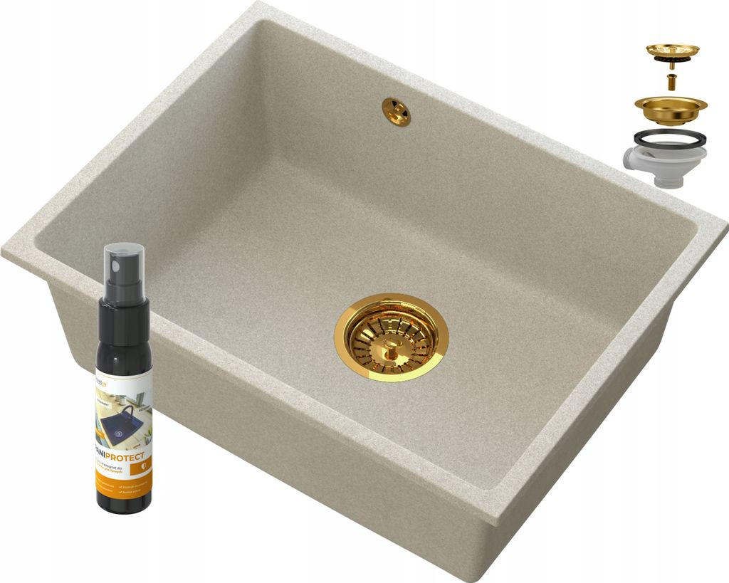 A beige sink with gold fixtures and a cleaning spray bottle.
