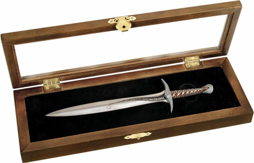 A letter opener shaped like a sword is displayed in a wooden box with a glass lid.