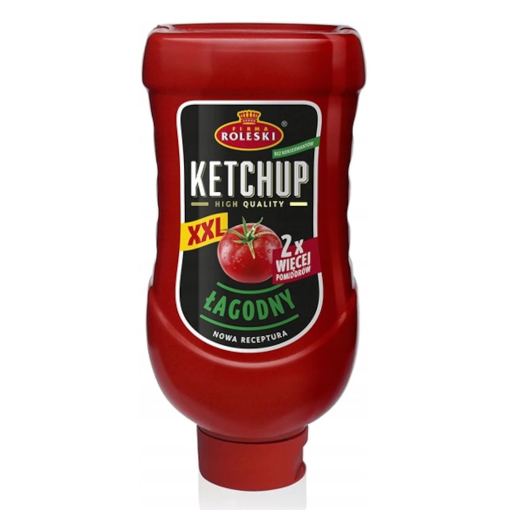 A red ketchup bottle with a label.