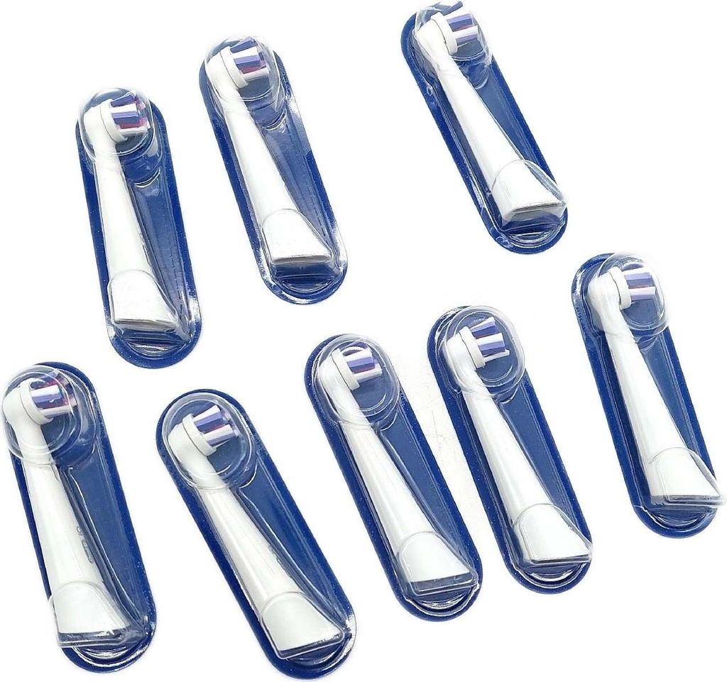 Multiple electric toothbrush heads in individual plastic packaging, arranged on a white background.