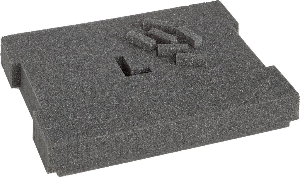 A gray foam insert with pre-cut sections for organizing items.