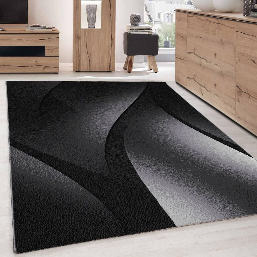 Moderner Teppich mit abstraktem optischem Wellenmuster, Schwarz und Grau 80 x 150 cm