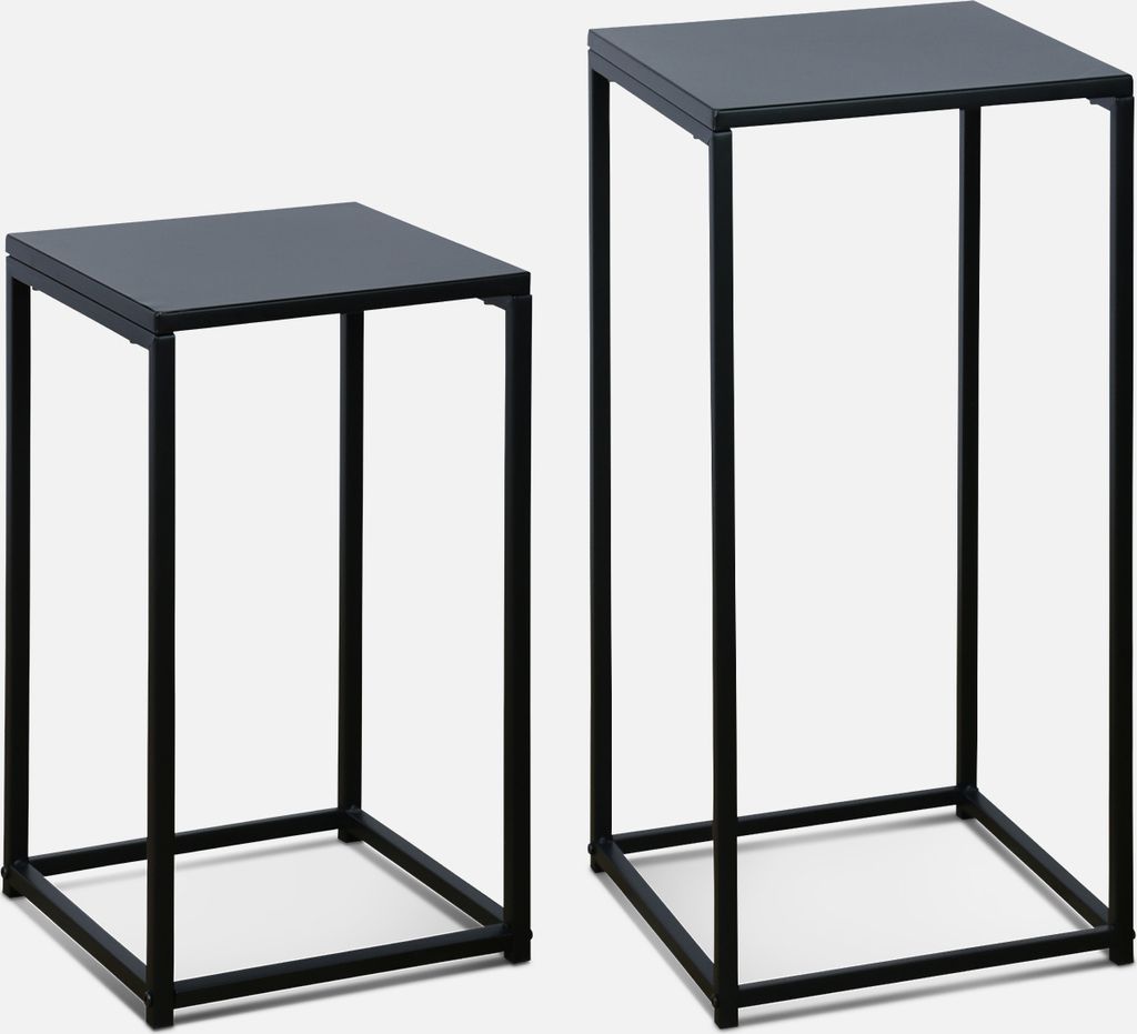 Two black metal side tables of different heights against a white background.
