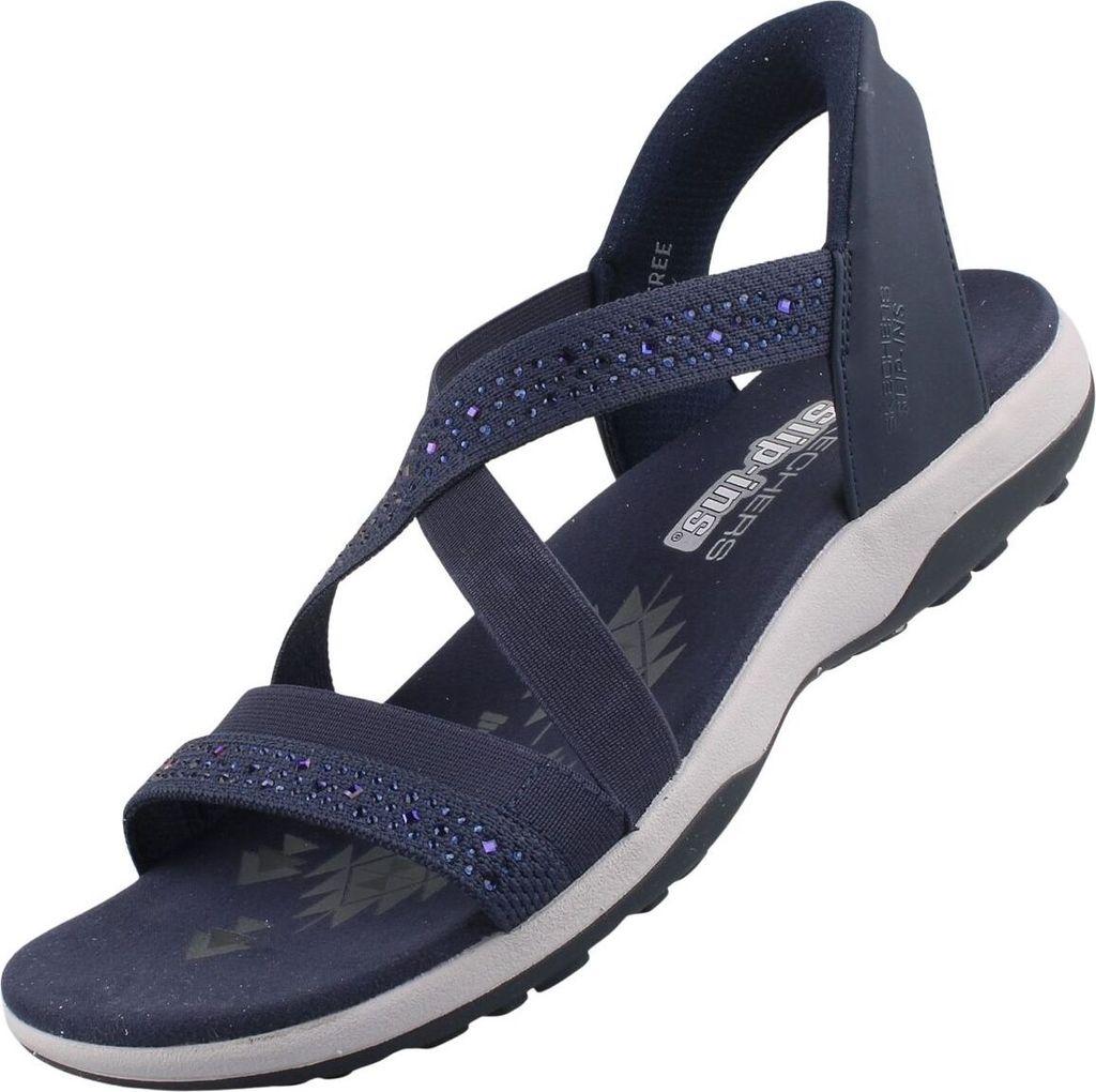 Auf dem Bild ist eine blaue Sandale zu sehen die von der Seite aufgenommen wurde. Die Sandale zeigt ein einfaches Design mit zwei breiten Riemen und einer flachen Sohle.