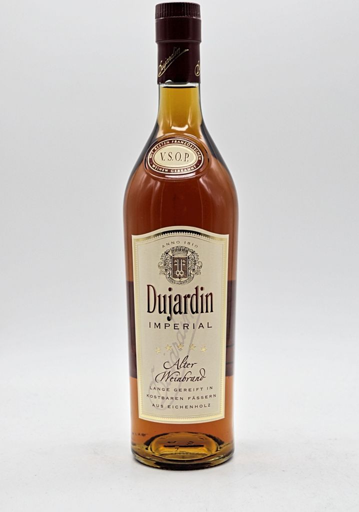 A bottle of Dujardin Imperial brandy against a white background.