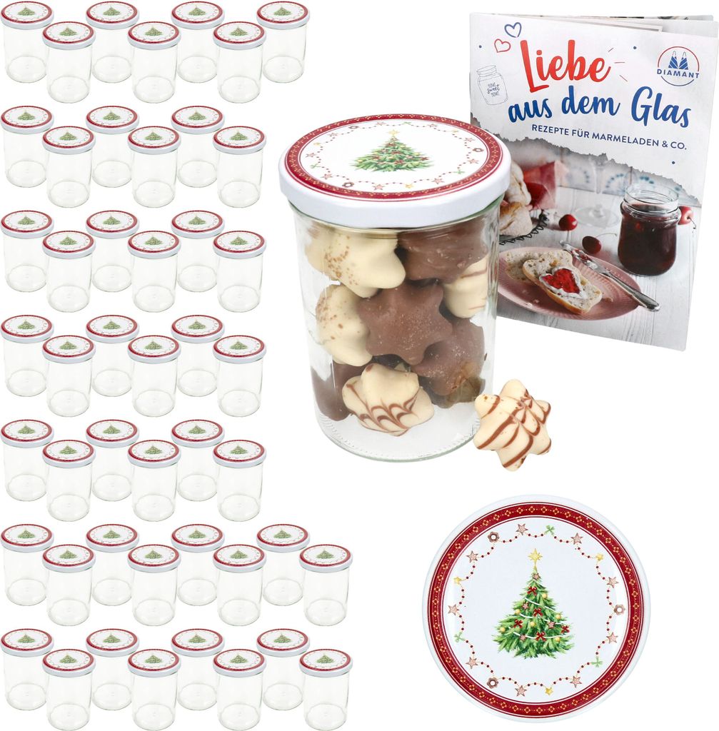 A collection of glass jars, a jar filled with cookies, a recipe book, and a decorative plate, all with a Christmas theme.