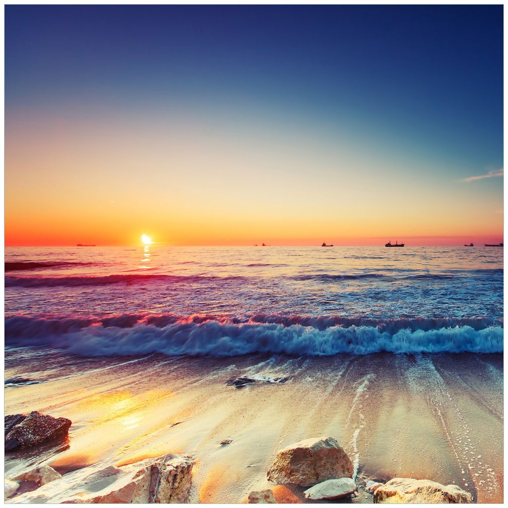 Wallario Magnet für Kühlschrank / Geschirrspüler, magnetisch haftende Folie - 60 x 60 cm, Motiv: Sonnenuntergang am Meer mit Wellen am Strand