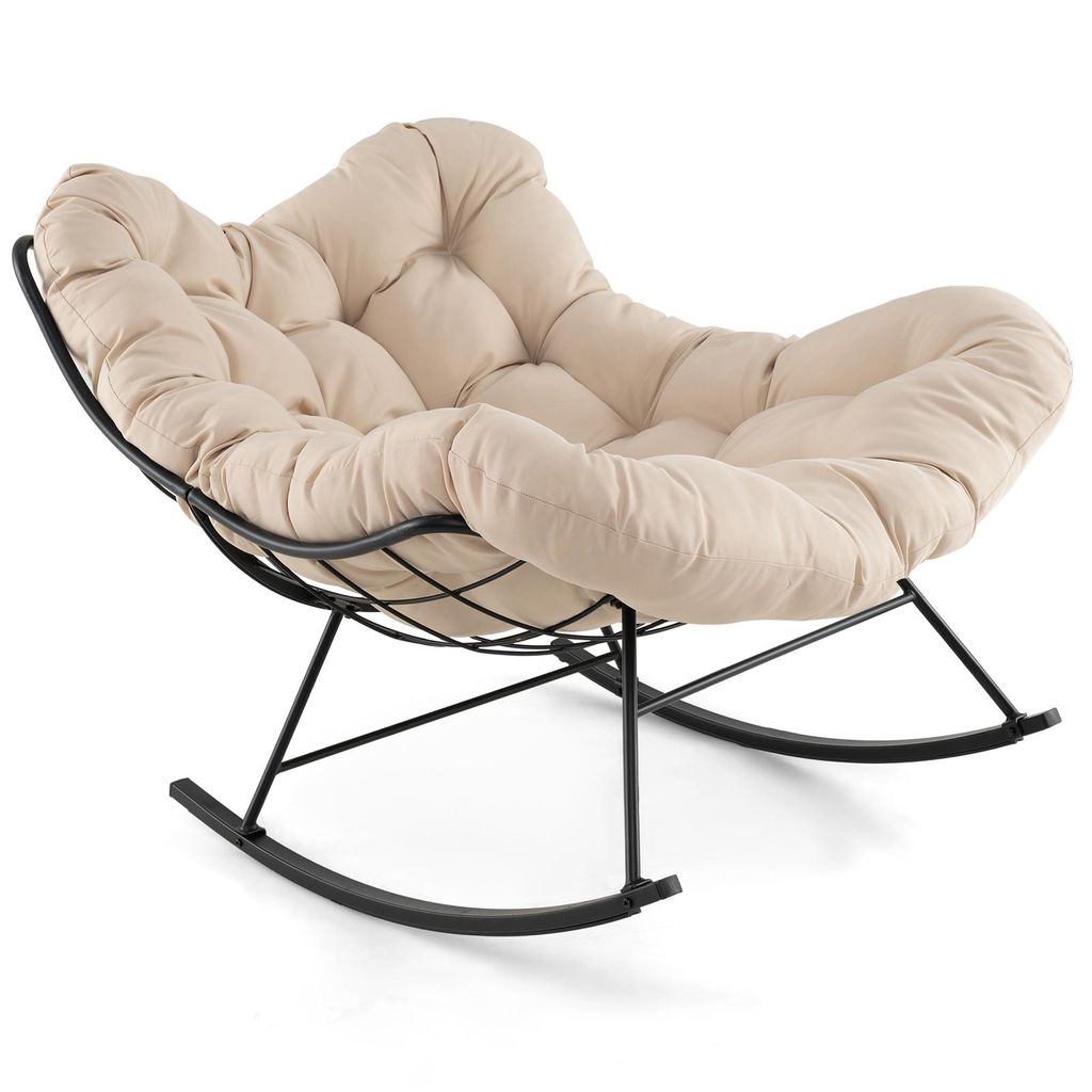 A beige upholstered rocking chair with a black metal frame is shown against a white background.
