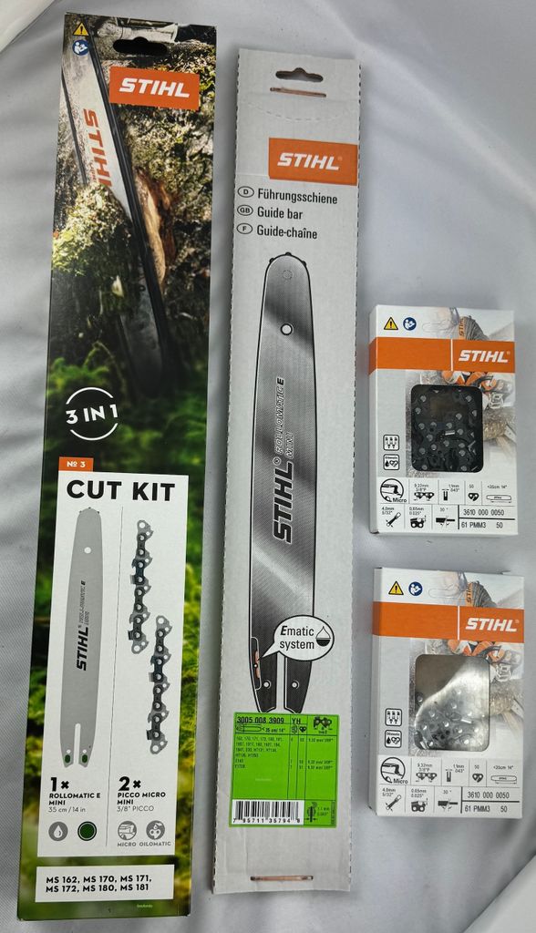 Several Stihl branded product packages are laid out on a white surface.
