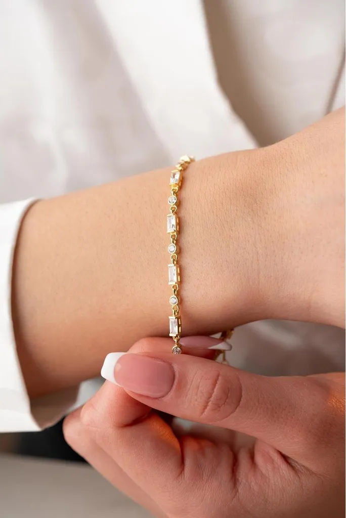 Bracelet femme en argent 925 motif baguette doré et zircons blancs
