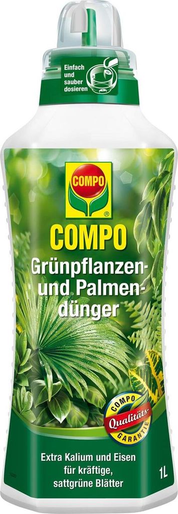 A bottle of plant fertilizer with green leaves depicted on the label.