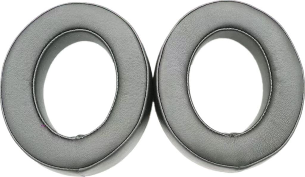 Two black ear pads for headphones are shown against a white background.