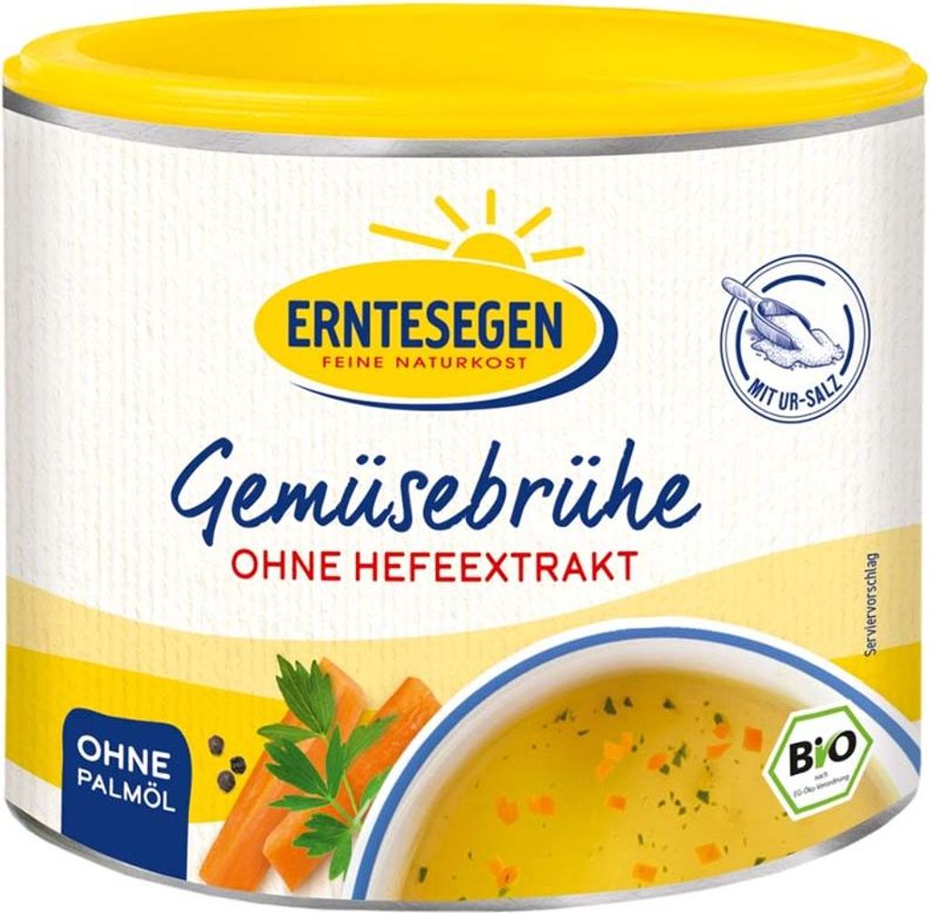 A can of vegetable broth with a picture of soup and vegetables.