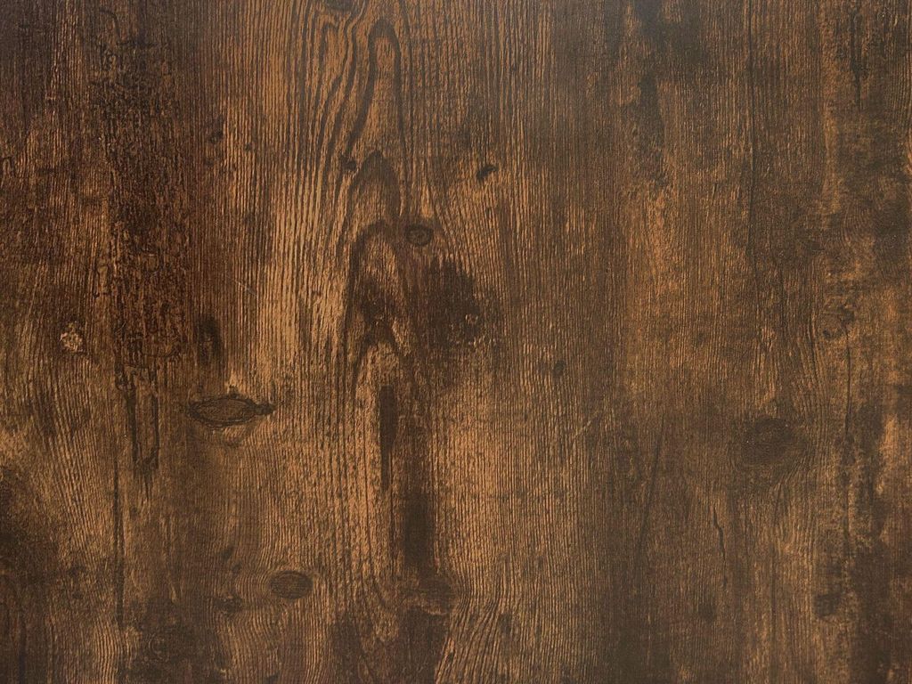 A close-up view of a dark brown wood grain texture.