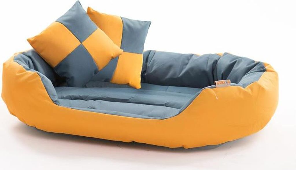 A pet bed with two pillows on a white background.