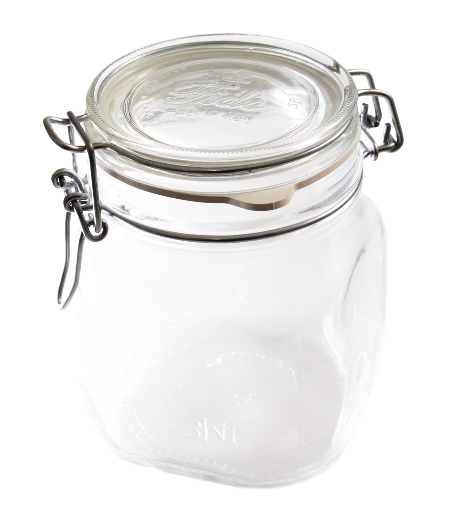 A clear glass jar with a wire bail closure and a glass lid, isolated on a white background.