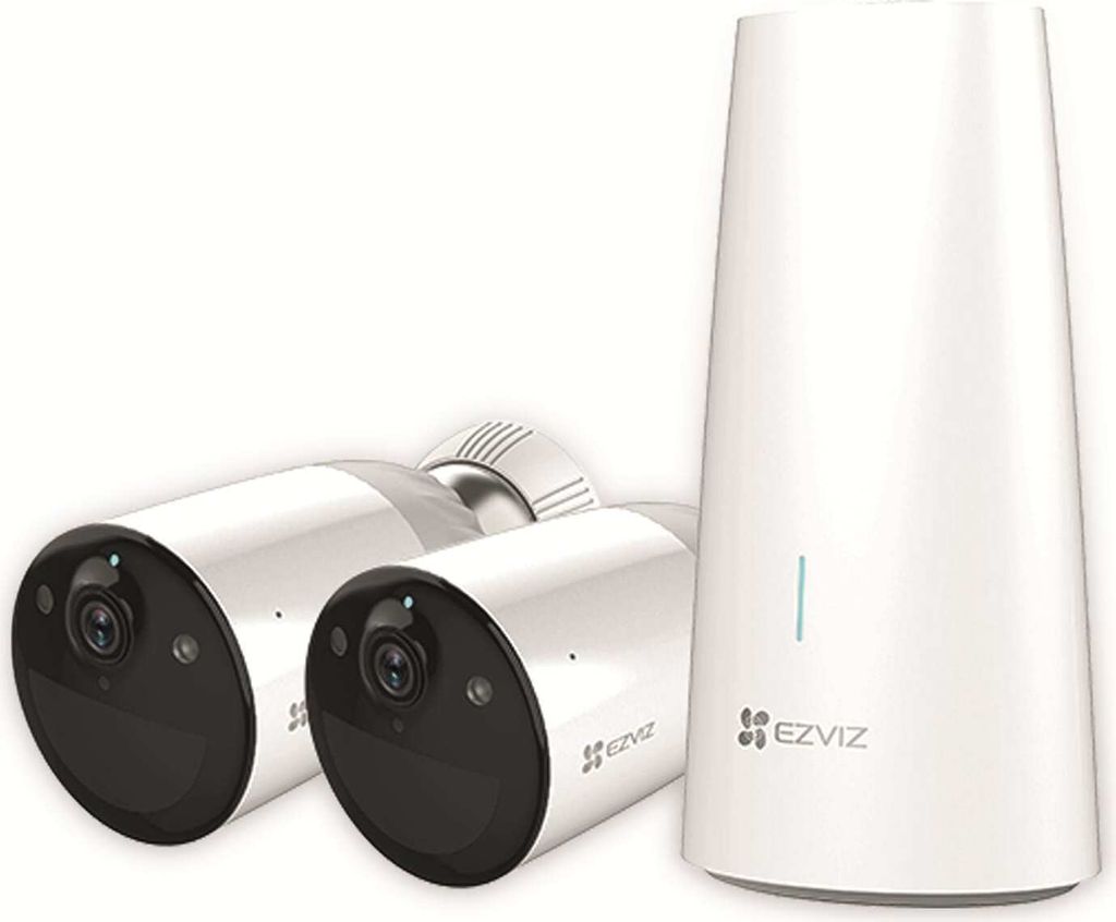 Two white security cameras and a white base station are displayed against a white background.