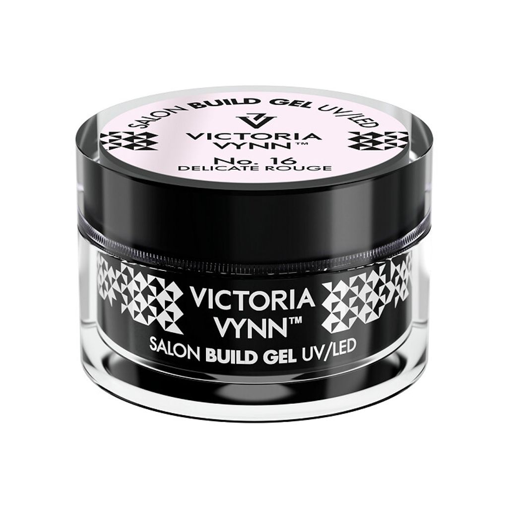 A studio shot of a Victoria Vynn Build Gel UV/LED nail product in a black and clear jar with pink labeling.