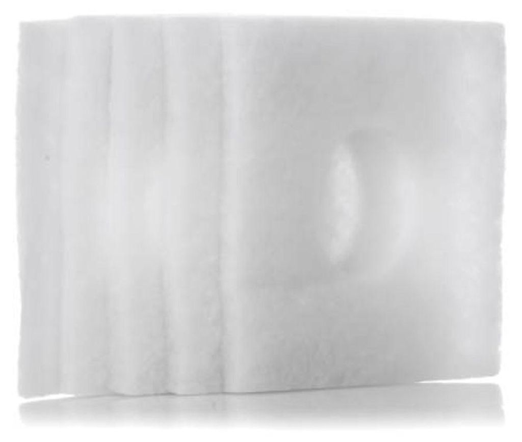 A stack of white filters with indentations on the front filter.