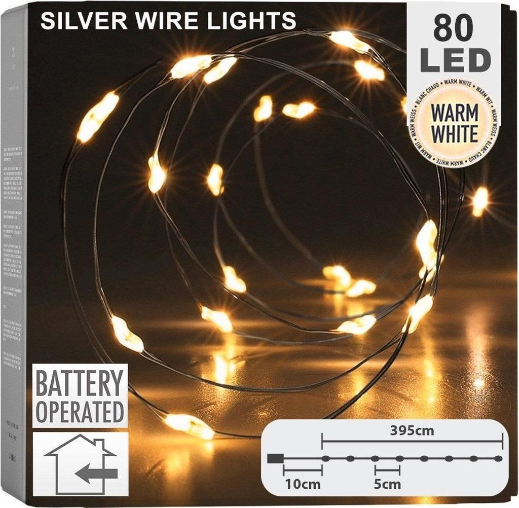 The image shows the packaging of silver wire lights with warm white LEDs.