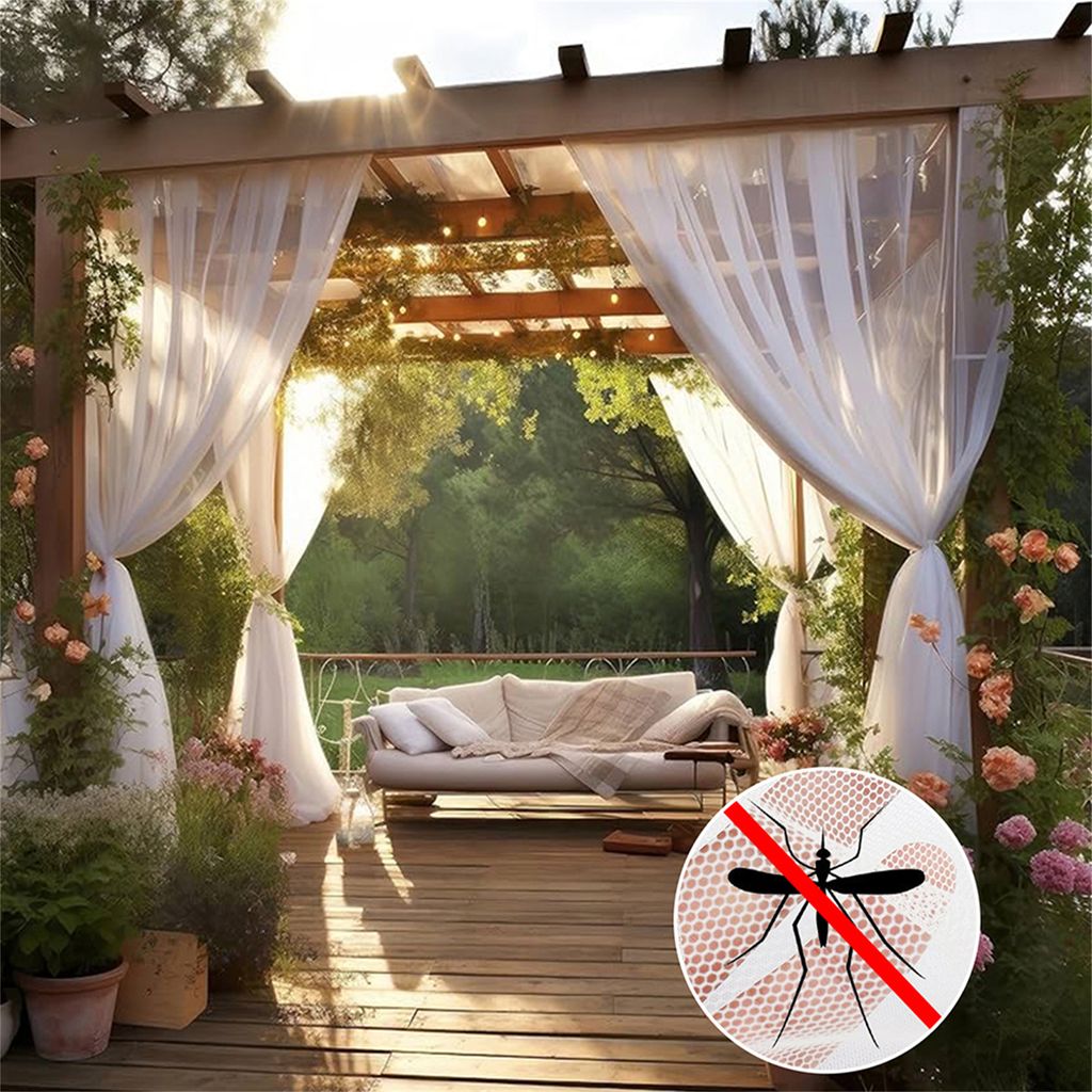 A beautiful outdoor patio with sheer white curtains, a comfortable sofa, and lush greenery, suggesting a serene and bug-free relaxation space.