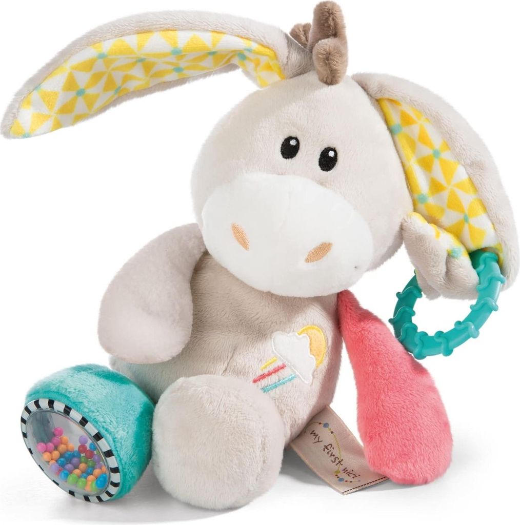 A plush toy donkey with various attached toys.