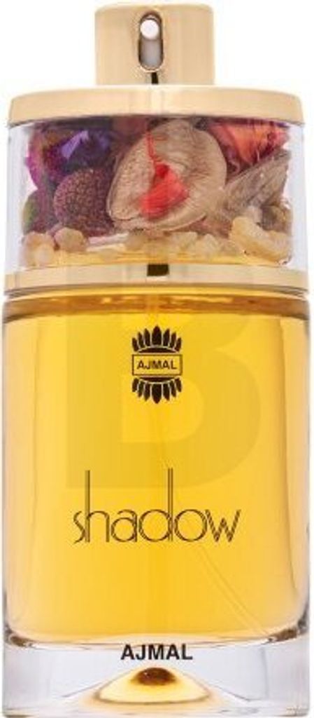 A perfume bottle with dried flowers in the cap.
