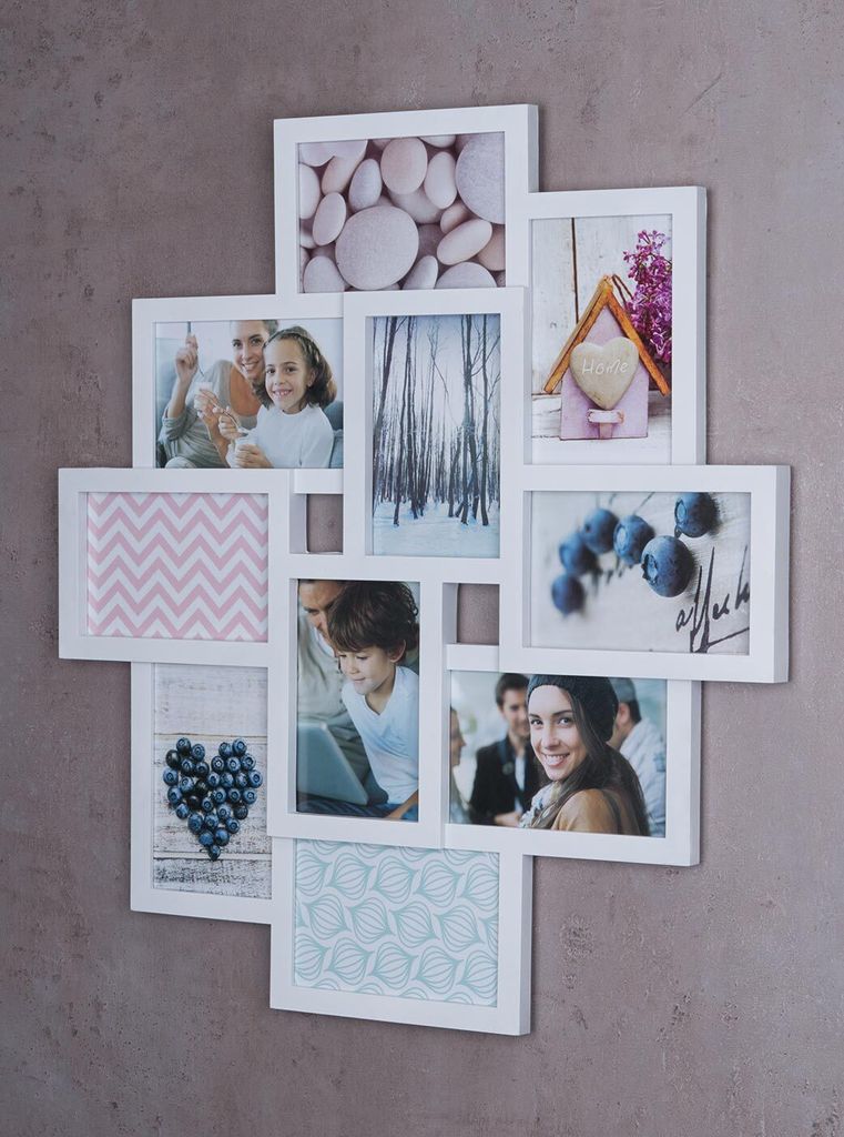 A collage of photos in a white multi-photo frame mounted on a textured wall.