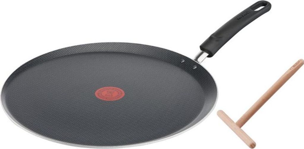 A black omelet pan with a red indicator and a wooden spreader on a white background.