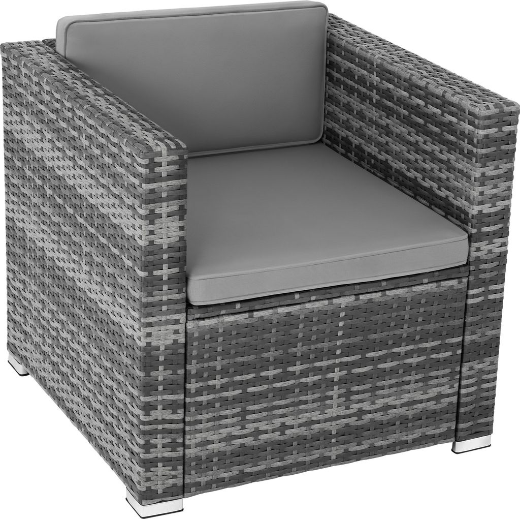 A single rattan armchair with gray cushions, shown from a three-quarter angle against a white background.