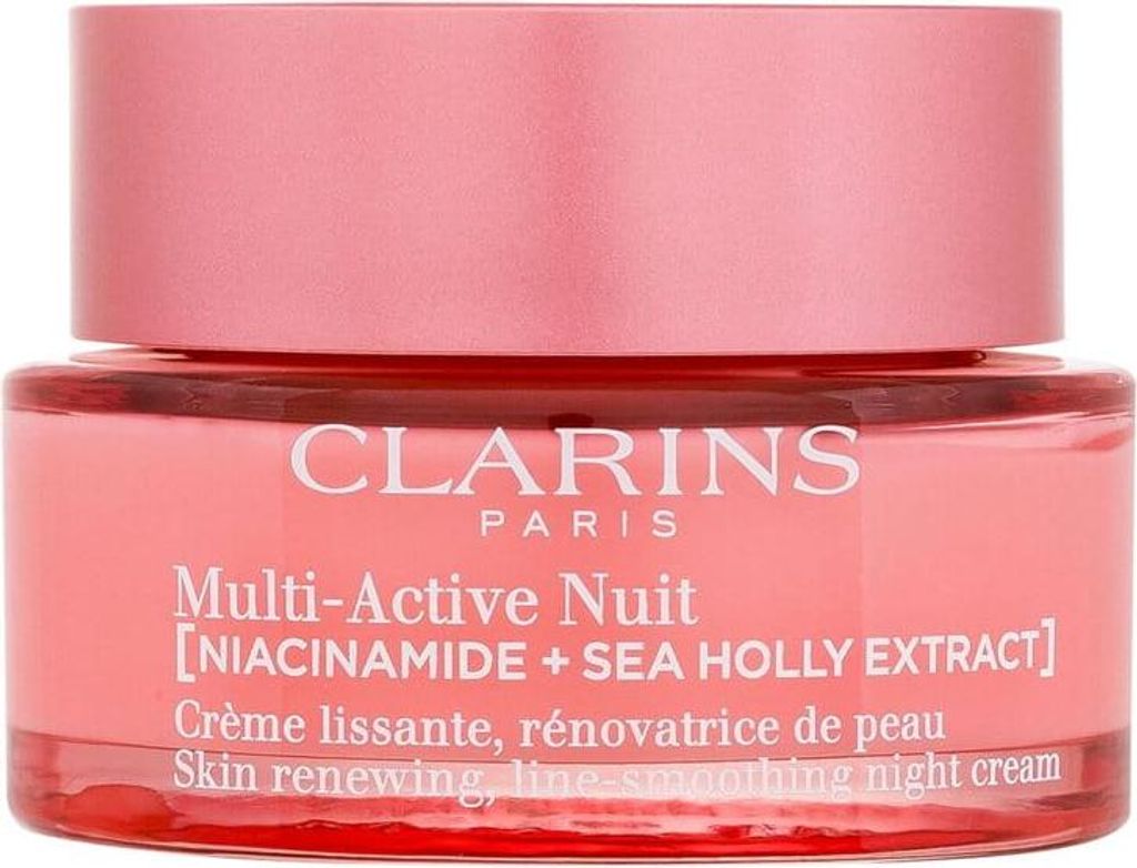 A close-up of a Clarins night cream jar.