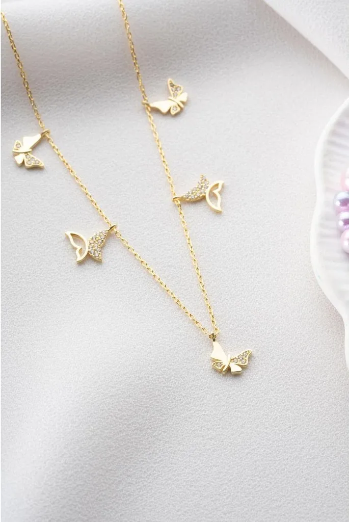 Collier papillon pour soirée : élégance argent et or, cadeau femme idéal