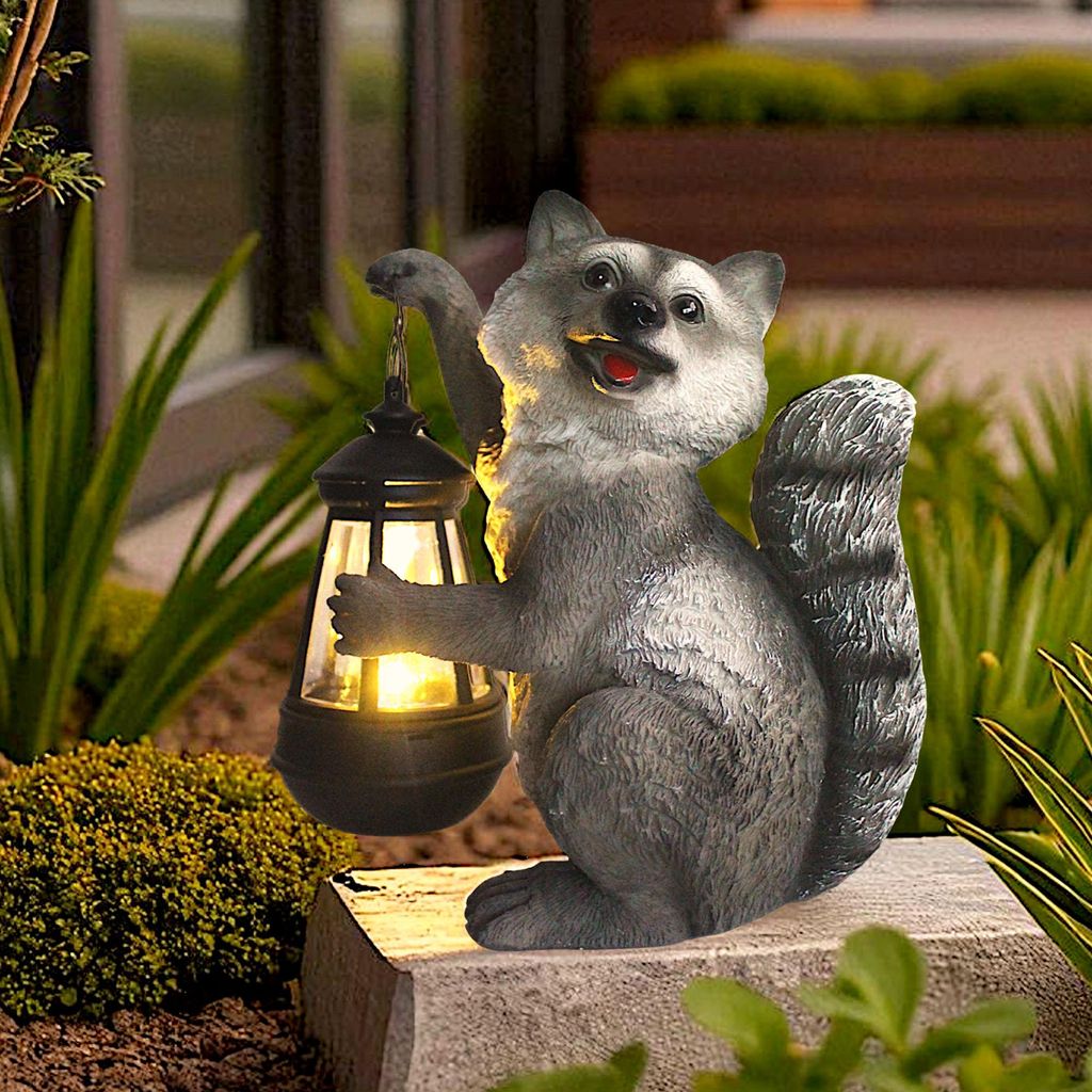 Waschbär Solarleuchte mit LED Laterne Solarlampe Gartenfigur aus Polyresin – warmweißes Licht bei Dämmerung – wetterfeste Deko 21 cm mit aus...