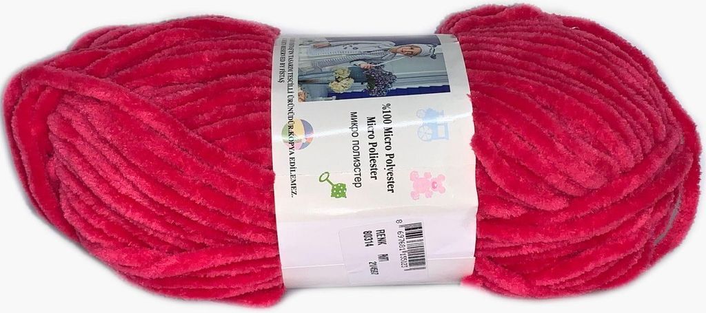 A ball of red yarn with a label wrapped around it.