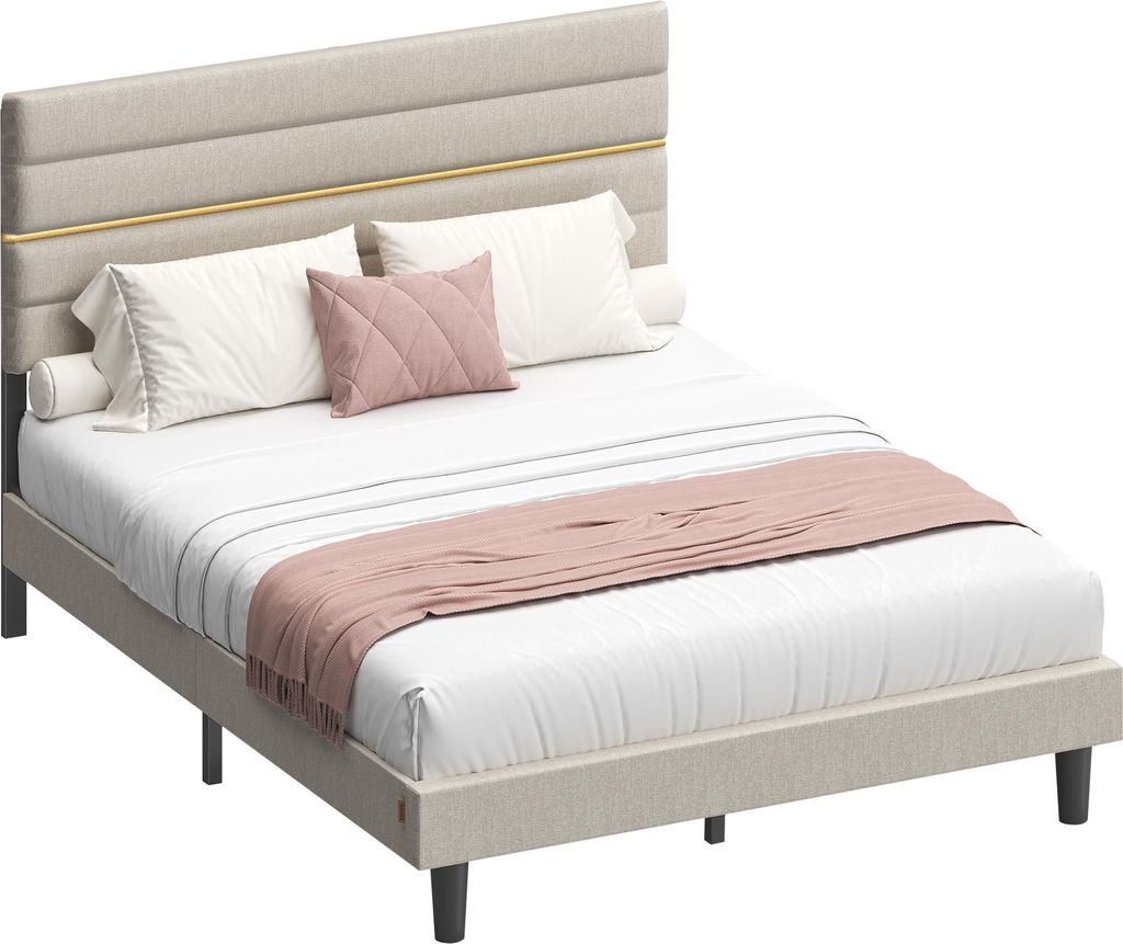 A bed with bedding and pillows, shown from a three-quarter angle.