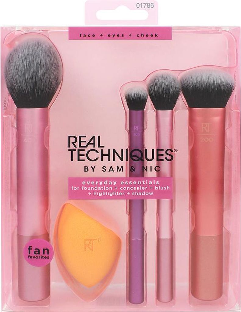 A set of makeup brushes and a sponge in their original packaging.