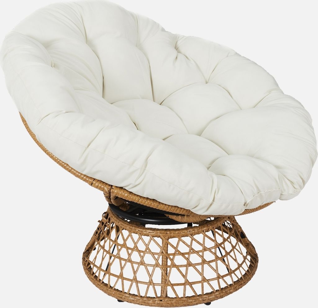 A papasan chair with a white cushion on a woven base.