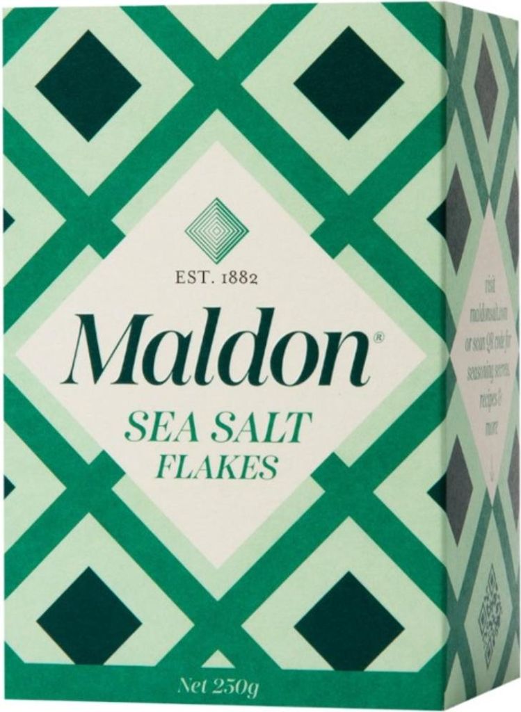 A box of Maldon Sea Salt Flakes with a green geometric pattern.