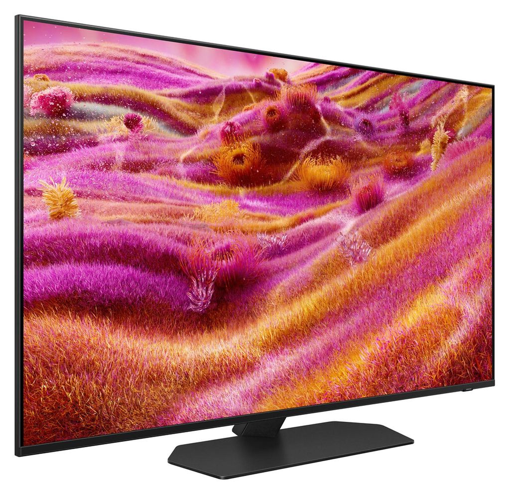 A television set displaying a colorful abstract image, placed on its stand.