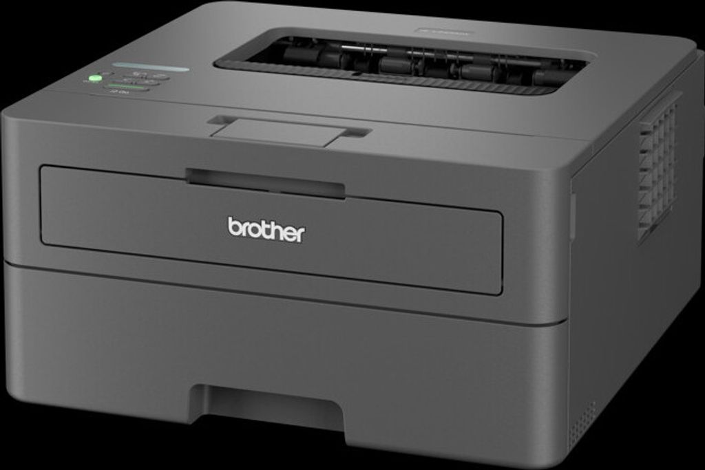 A black Brother laser printer is shown against a black background.