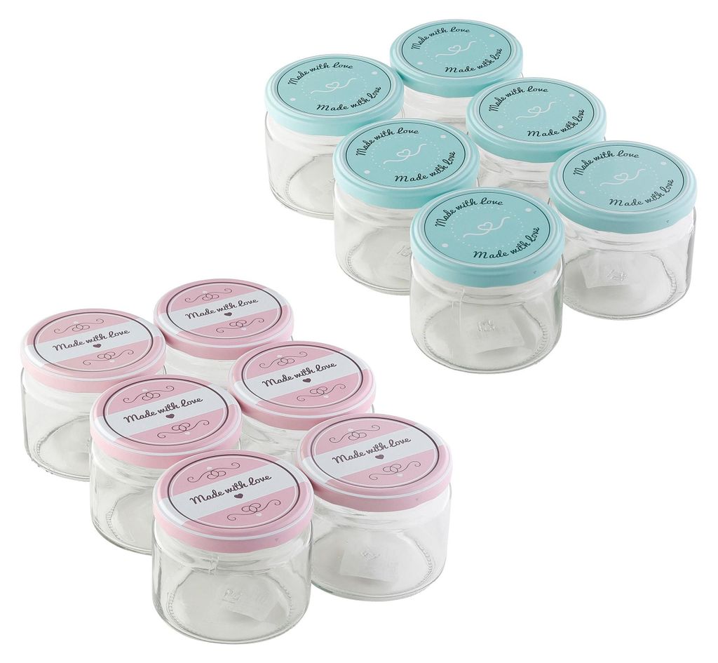 A collection of small glass jars with decorative lids.