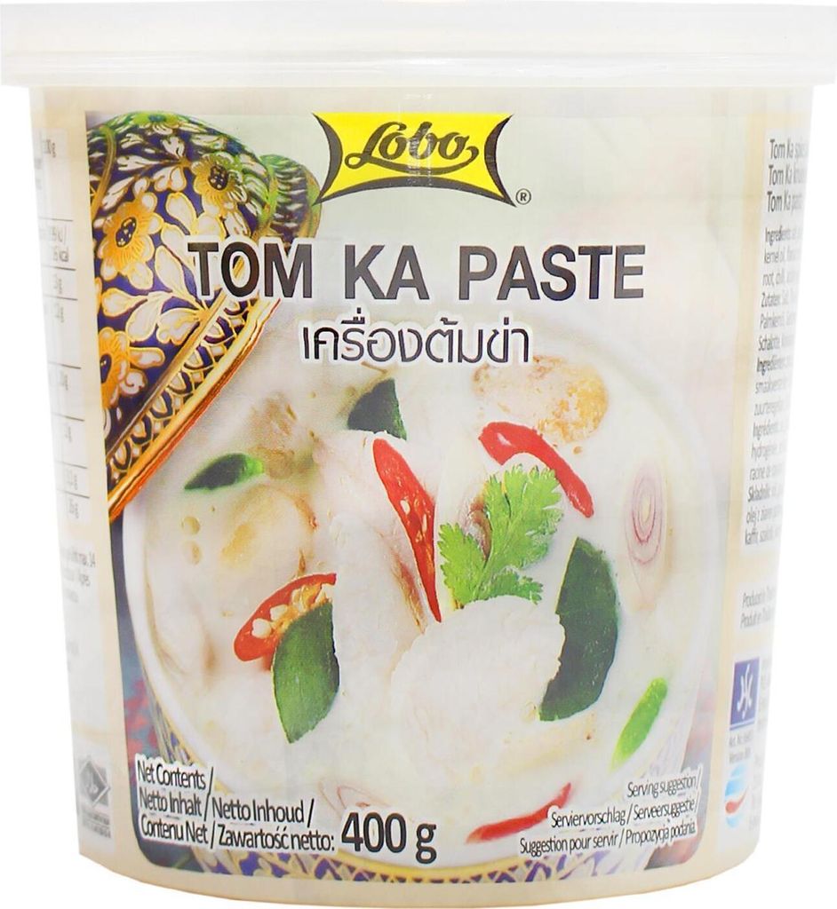A product shot of a container of Tom Ka Paste.