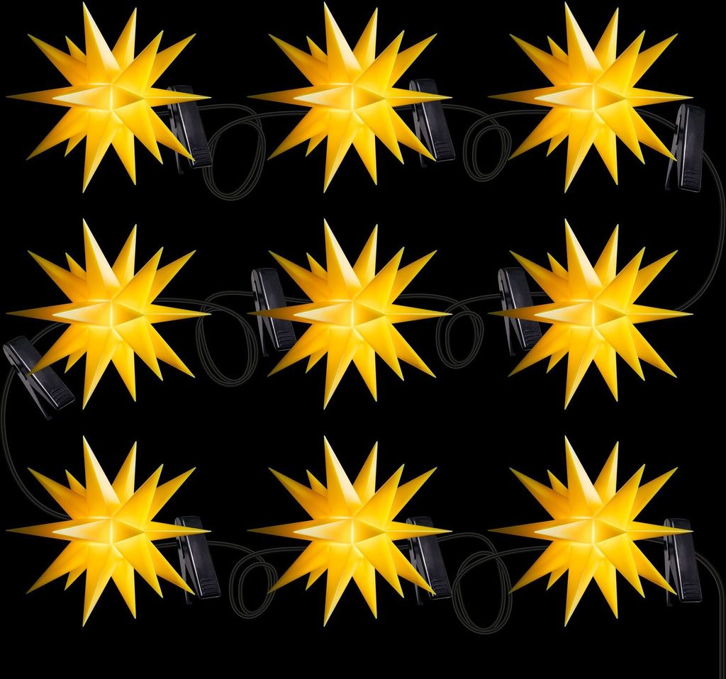 A string of nine yellow star-shaped lights on a black background.